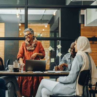 Group of people meeting around a table